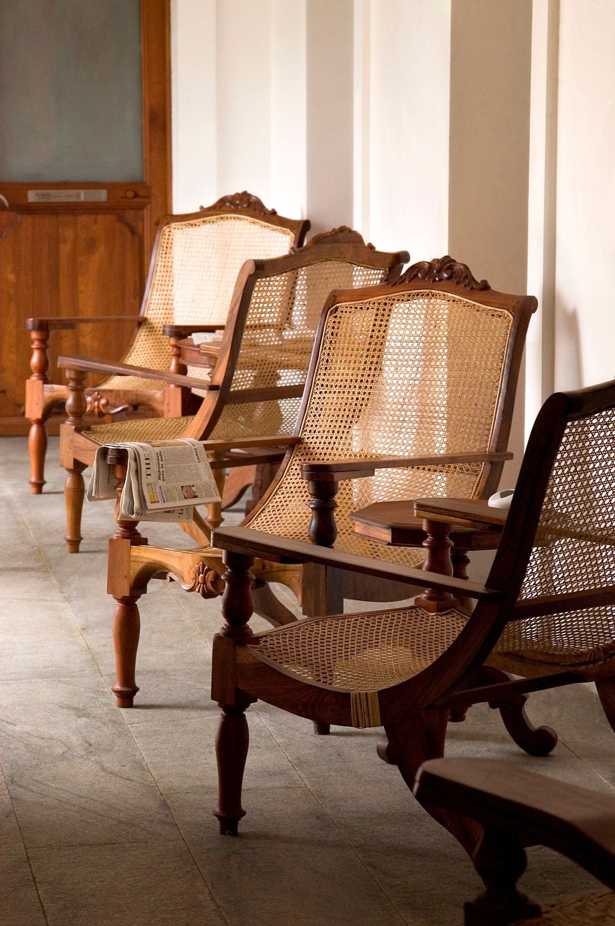 Heritage home veranda cane lounge chairs inline